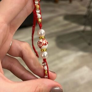 Handmade red gold and white beaded bracelet